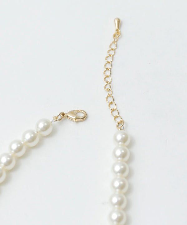 niana フラワーモチーフネックレス ベージュ