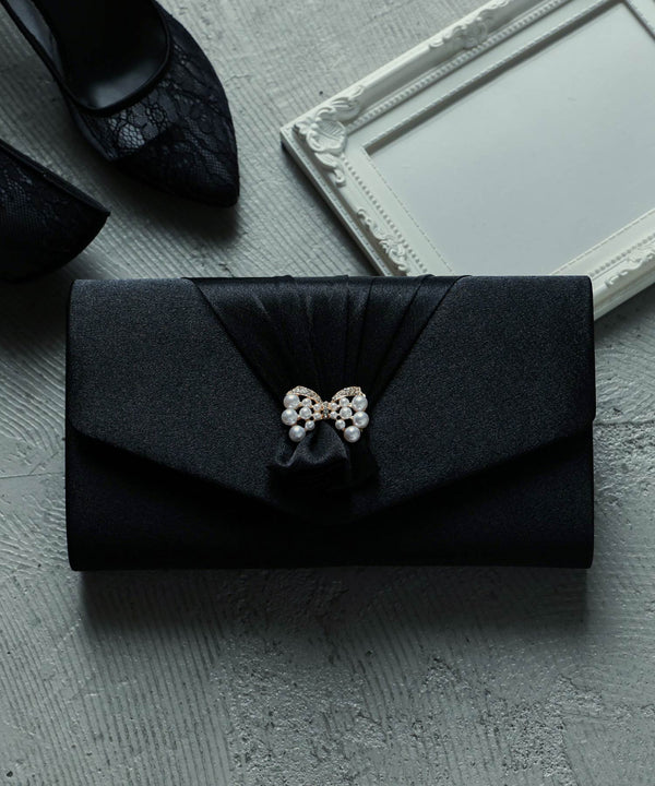 niana リボンタックサテンクラッチバッグ